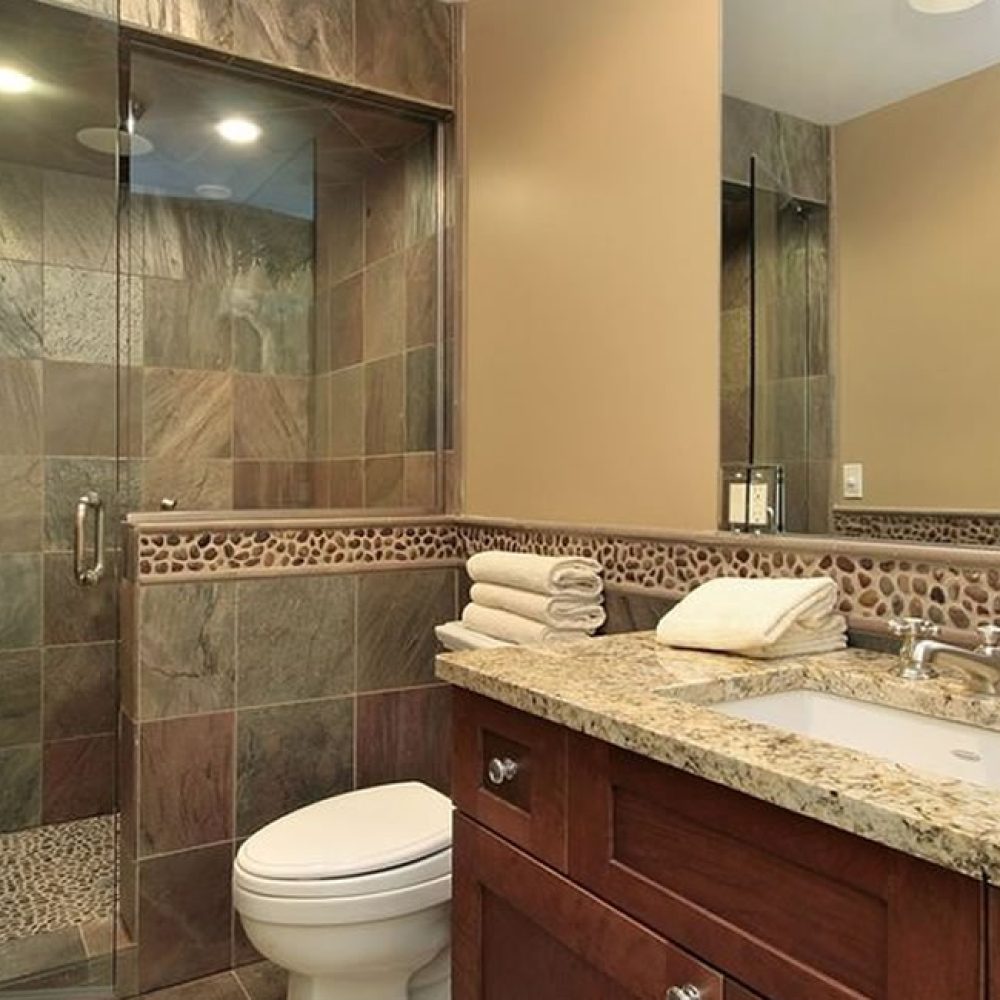 Frameless-shower-door-panel-on-rise-slider